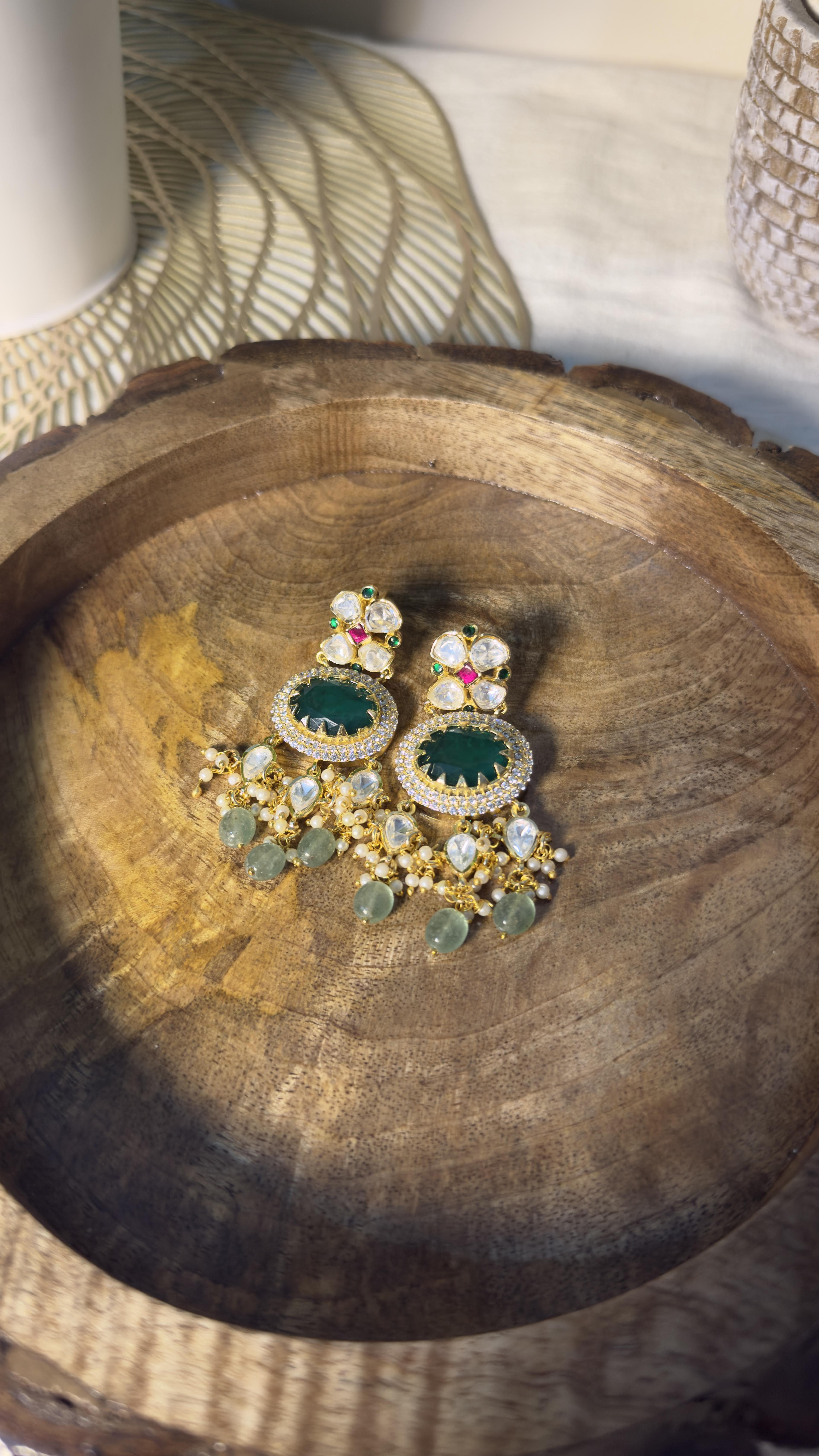 Samridhi Collection floral kundan choker with sage-green bead drops on carved wood